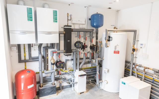 Heating System Project - Swakeleys Rd: A detailed view of an intricate heating system installation showcasing high-quality appliances.
