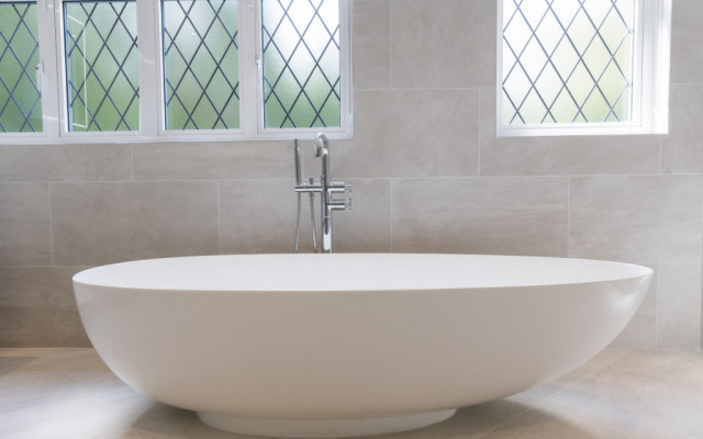 Experience luxury with Aqualite's exquisite freestanding bath, perfect for stylish contemporary bathrooms.
