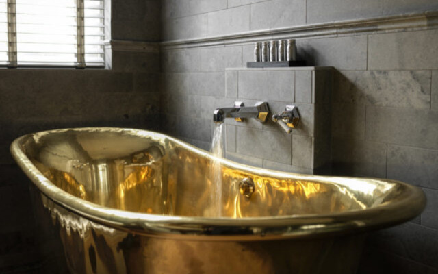 Indulge in Luxury with this Stunning Gold Bath