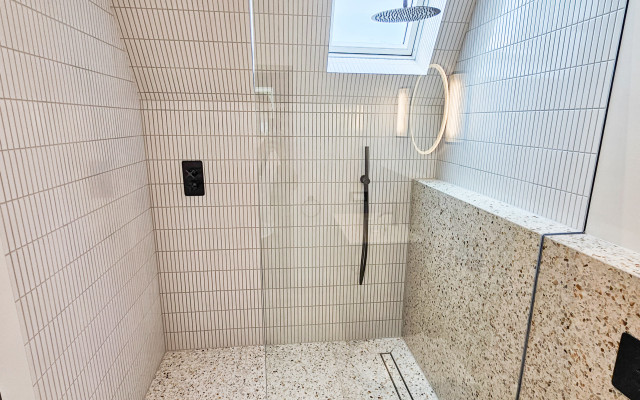 Elevate your bathing experience with our luxurious walk-in shower design. Perfectly blending modern aesthetics with functionality.