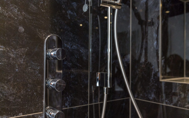 Experience luxury in your bathroom with Aqualite's exquisite shower design.