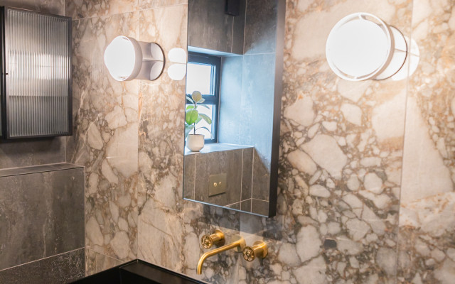Elegant Black Floating Basin with Stylish Fixtures
