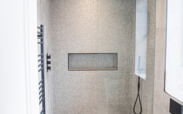 Elegant bathroom renovation showcasing modern design elements.