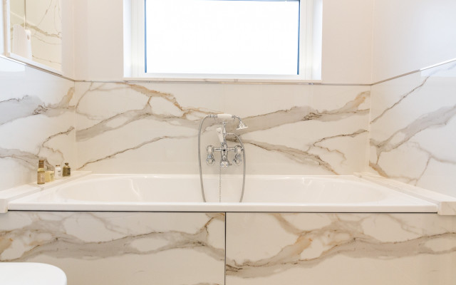 Discover the elegance of Aqualite's luxury fitted double-ended bath, a perfect addition to any modern bathroom.