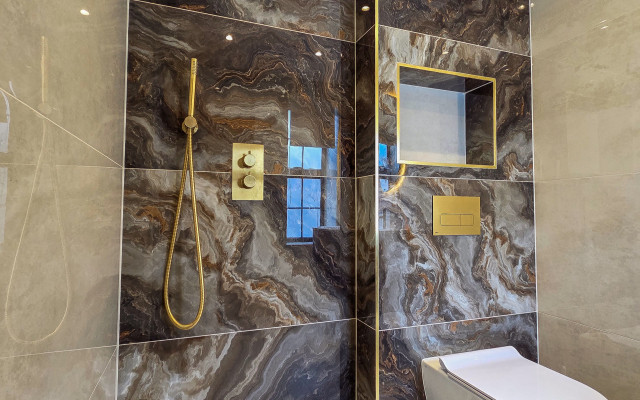 Elegant Wetroom Design with Marble Tiles