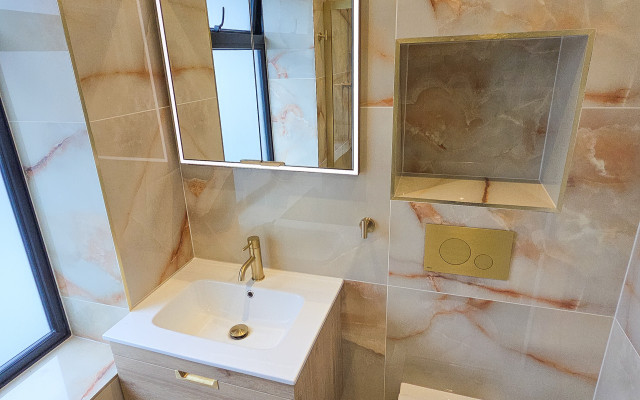 Elegant Bathroom Featuring Modern Basin and Toilet