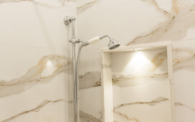 Elevate your shower experience with our traditional overhead and hand shower combination, featuring a sleek design and luxurious functionality.
