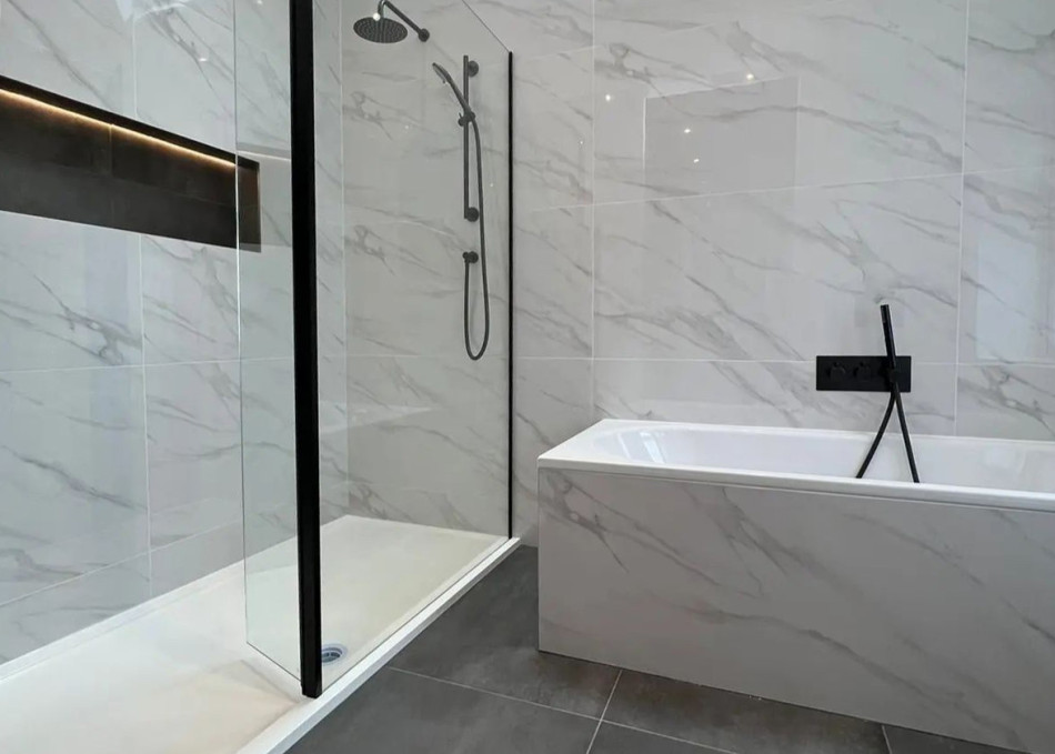 Elegant walk-in shower display featuring modern fittings and luxurious finishes.
